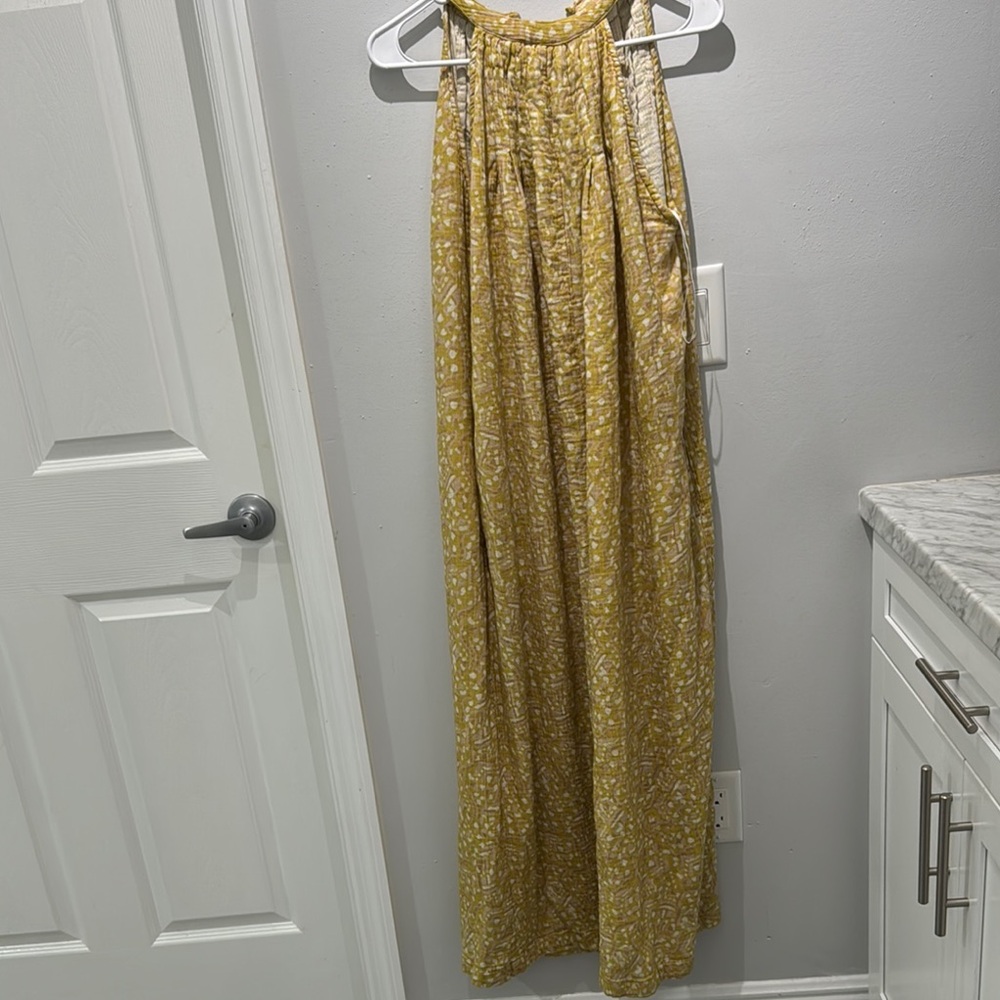 Yellow Sequin Jumpsuit with Halter Neck and Wide-Leg Pants